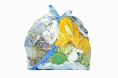 Staff documenting a missed collection with a mobile device